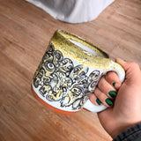 Black and Yellow Funky Faces Sleeve Mug with Black and Yellow Lip Drip